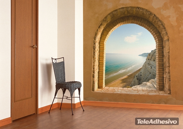 Un fotomural de una ventana con vistas a la playa puede formar parte de tus ideas de decoración