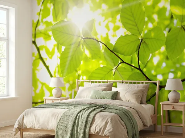 Fotomural de hojas verdes a contraluz en un dormitorio