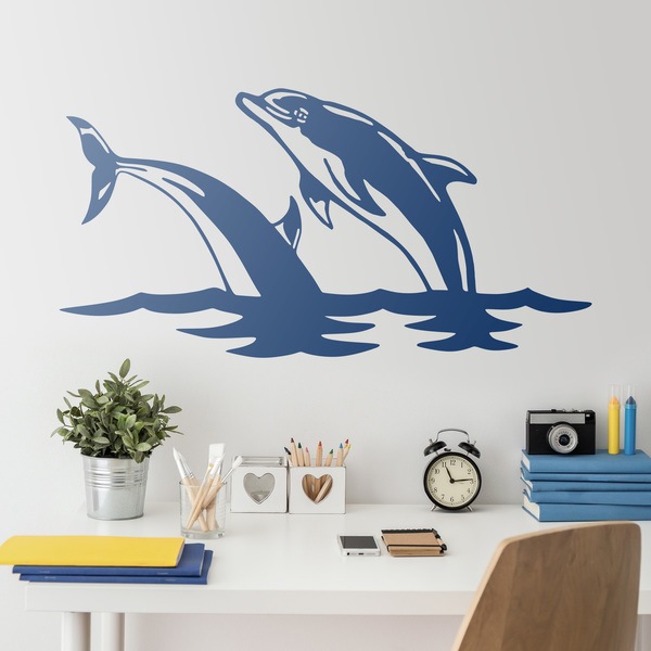 Vinilos Decorativos: Pareja de delfines saltan en el mar