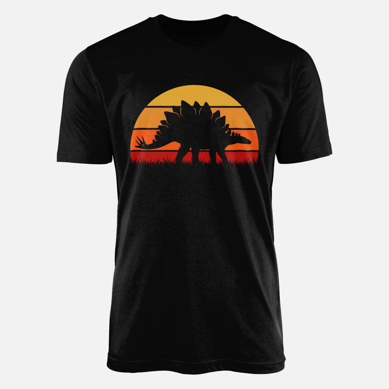 Camisetas: Silueta de estegosaurio en la hierba